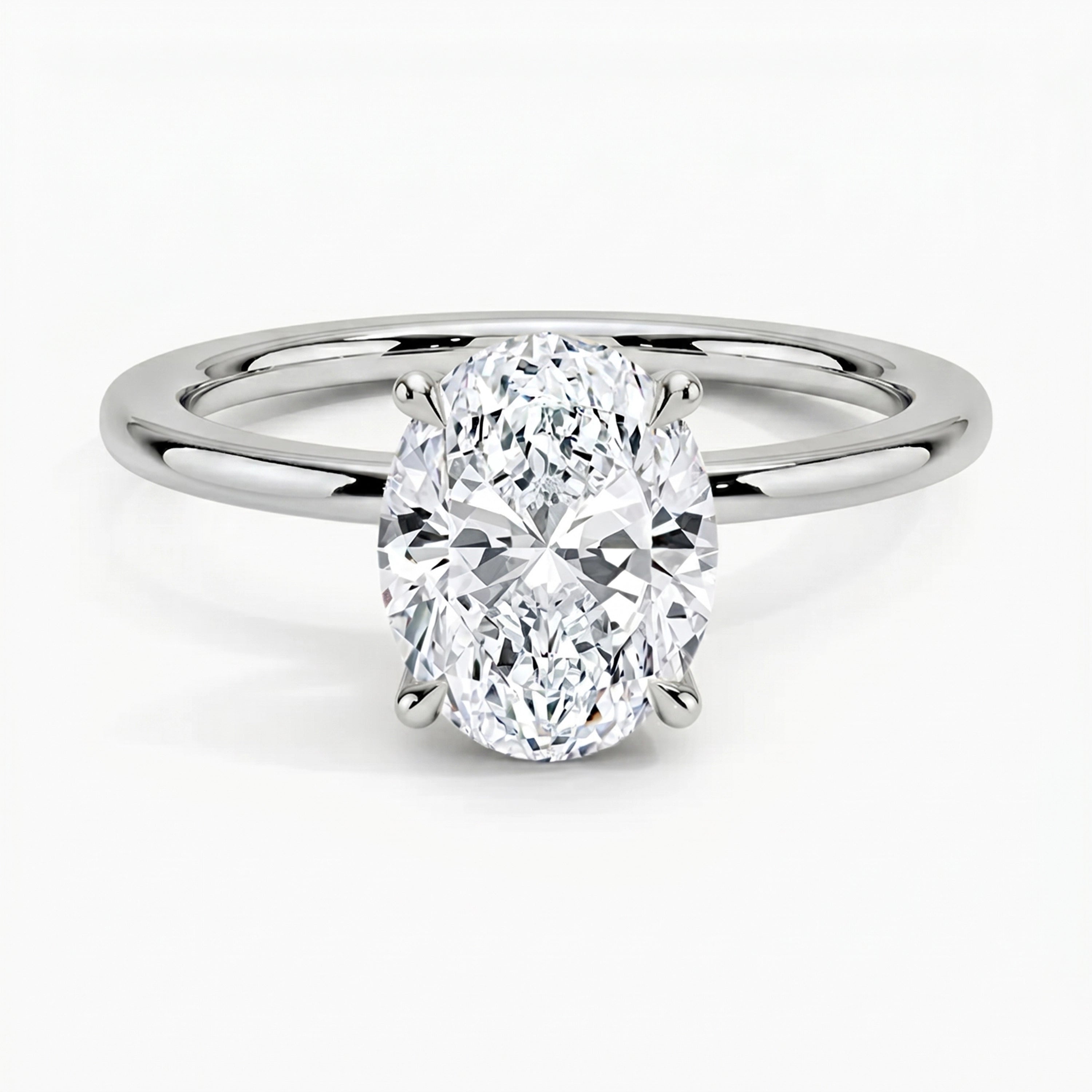 Classic Four-Prong Oval Solitaire Ring