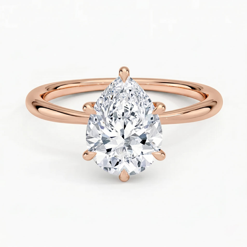 Iris Pear Solitaire Ring