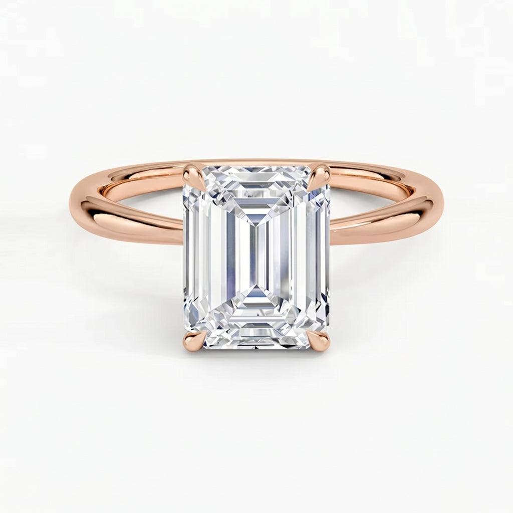 Iris Emerald Solitaire Ring