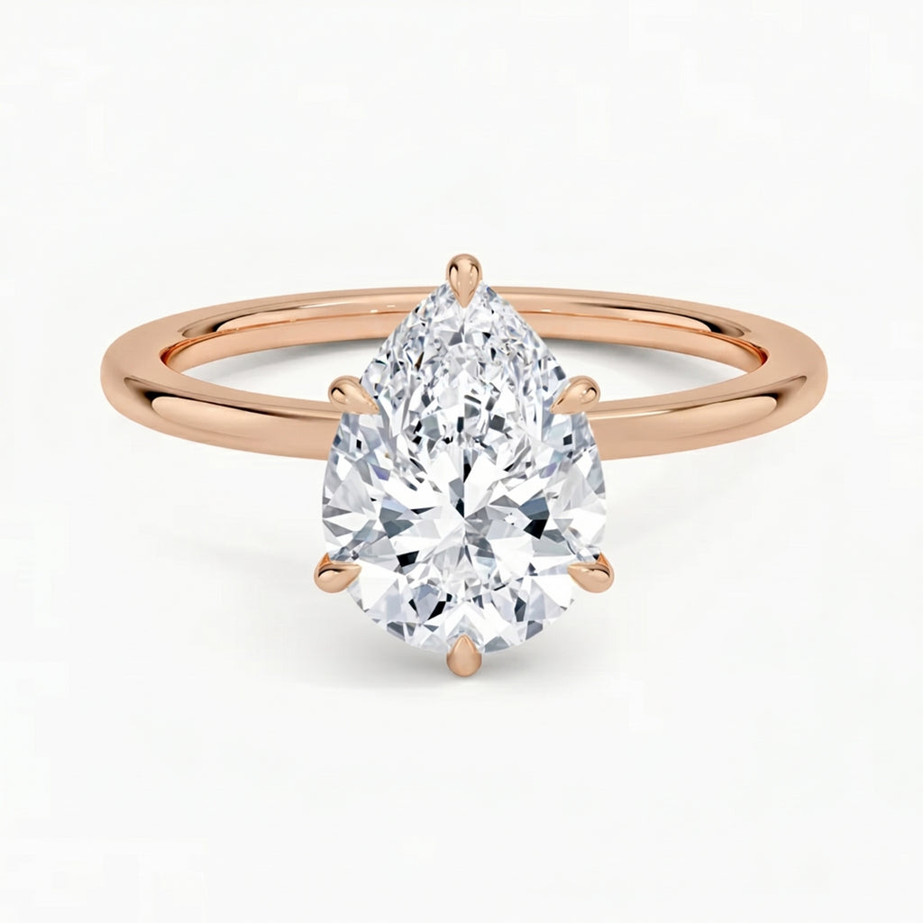 Hidden Halo Pear Solitaire Ring