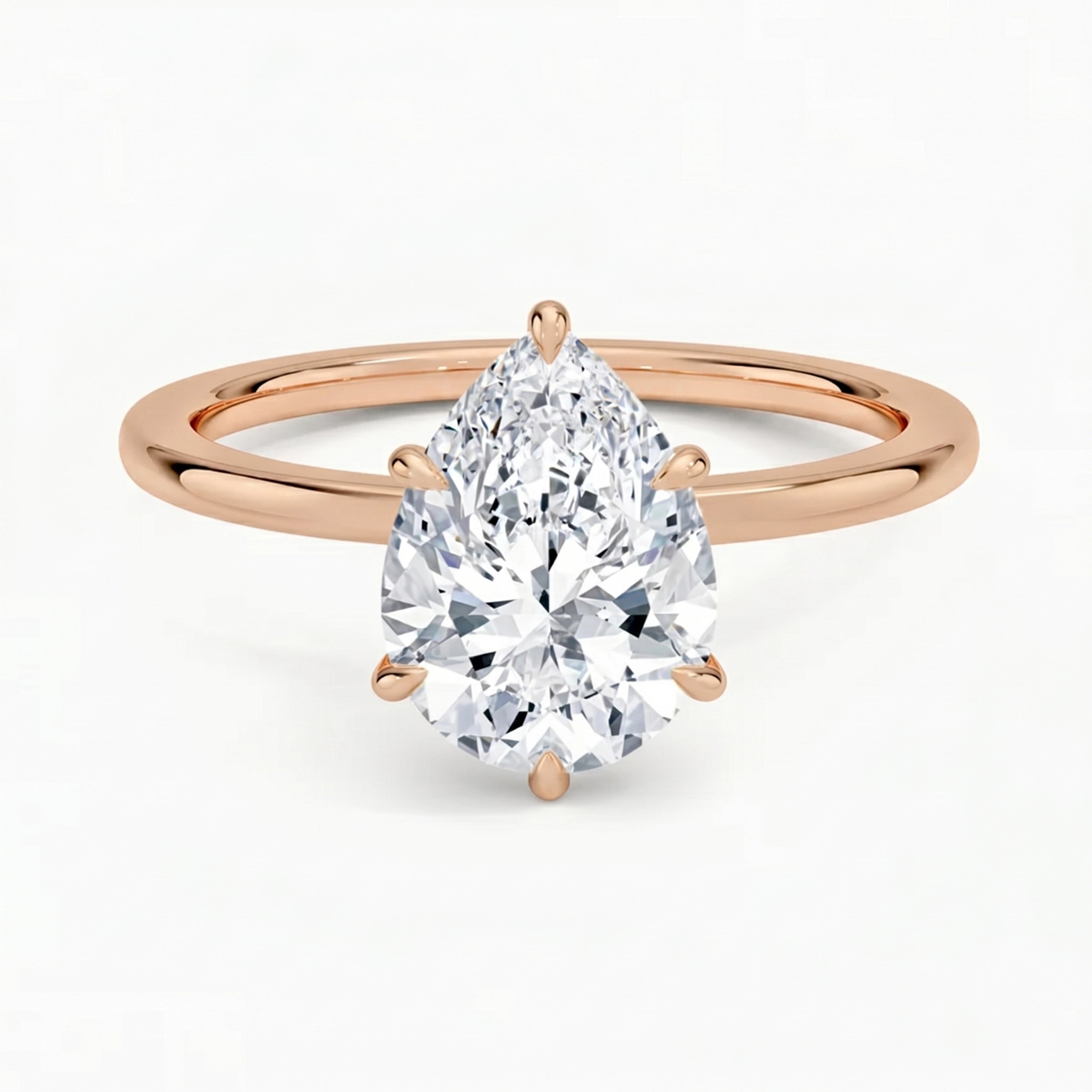 Hidden Halo Pear Solitaire Ring