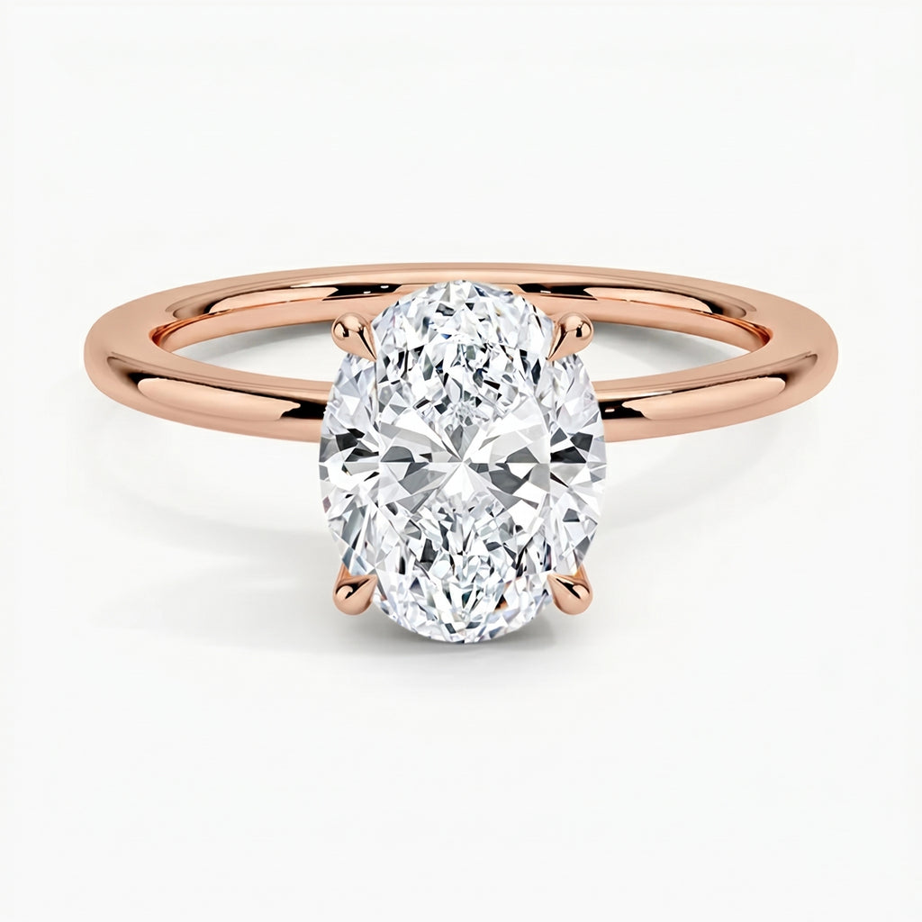 Classic Four-Prong Oval Solitaire Ring