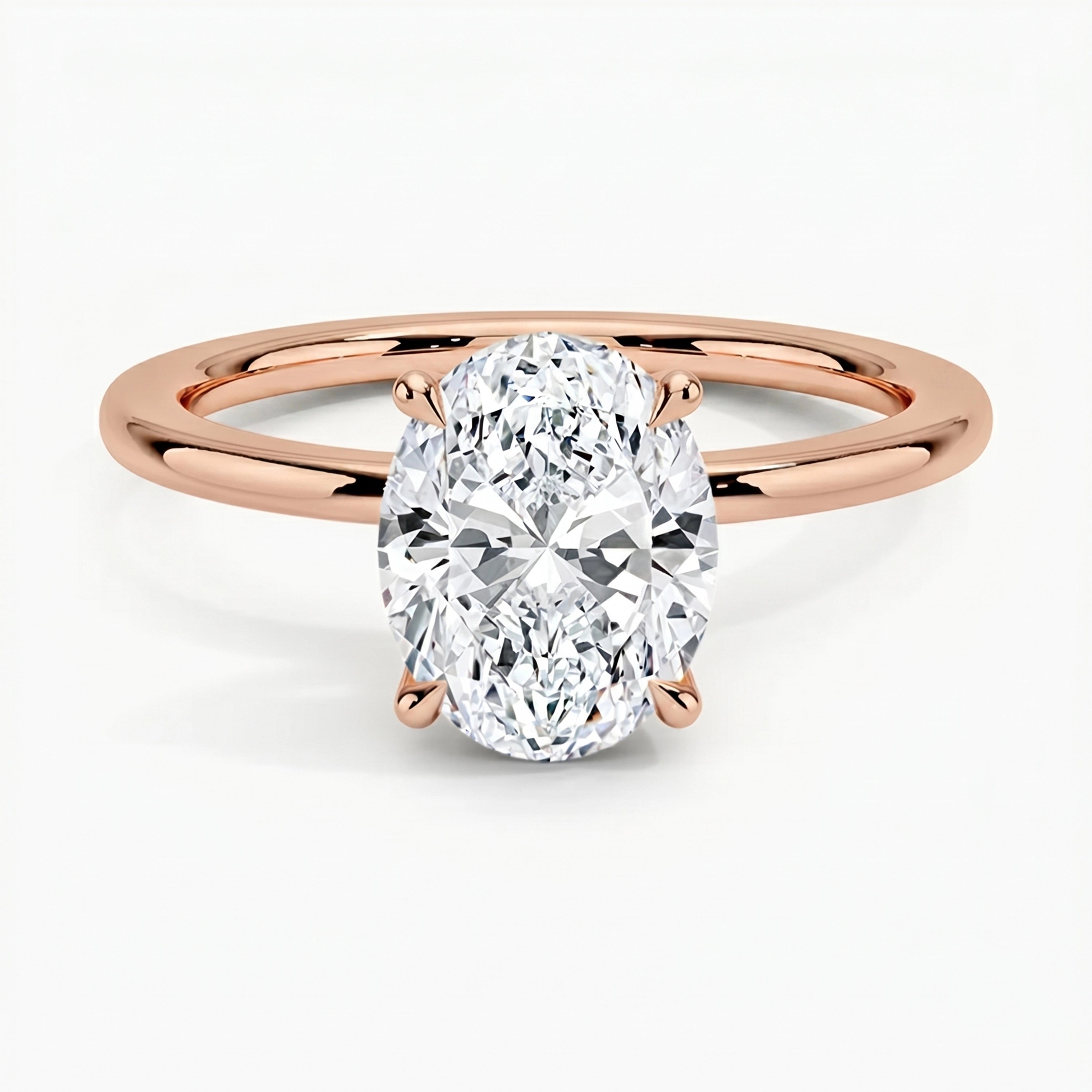 Classic Four-Prong Oval Solitaire Ring