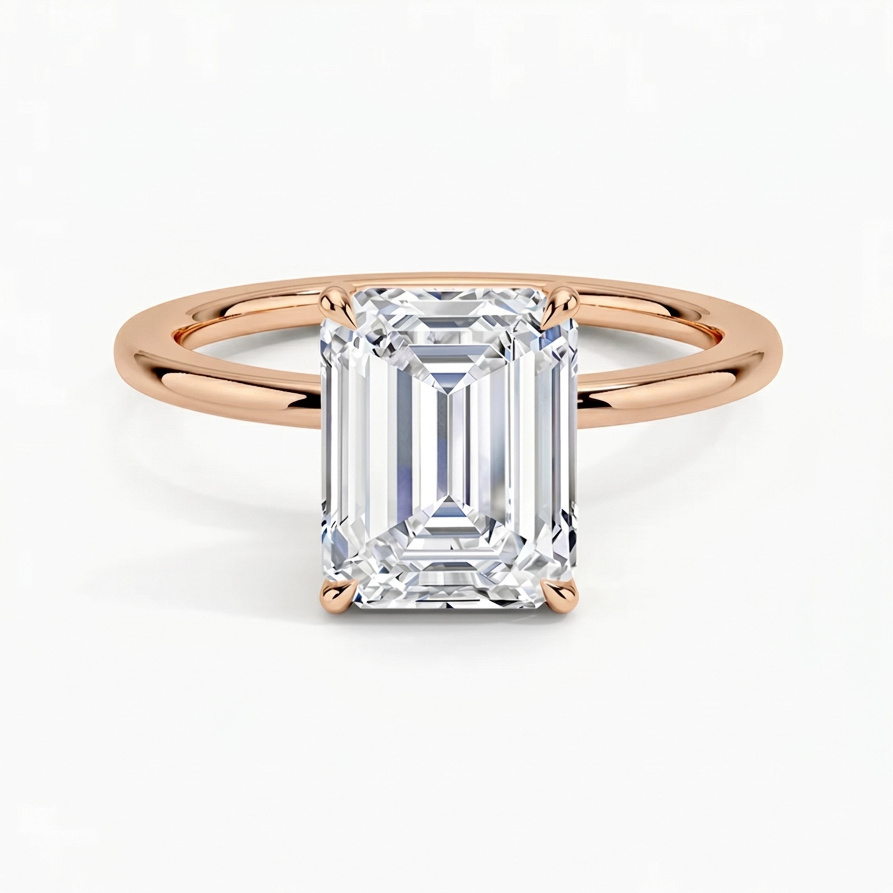 Classic Four-Prong Emerald Solitaire Ring