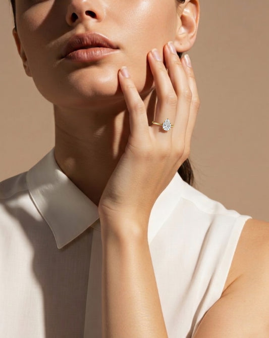 Hidden Halo Pear Solitaire Ring