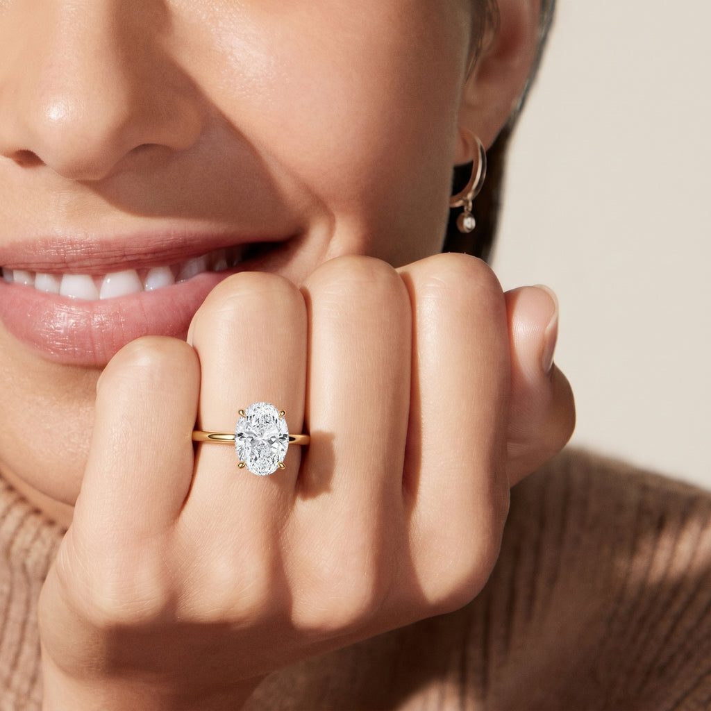 Classic Four-Prong Oval Solitaire Ring