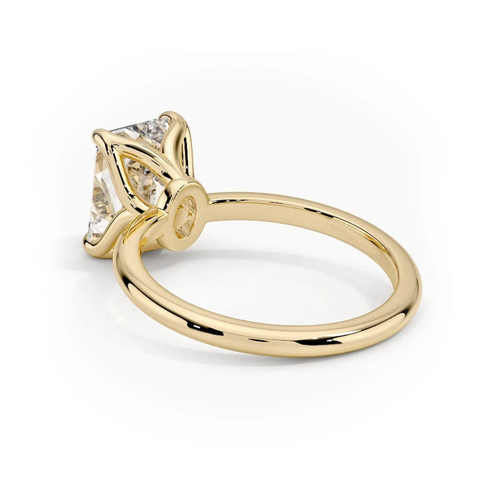 Flora Emerald Solitaire Ring