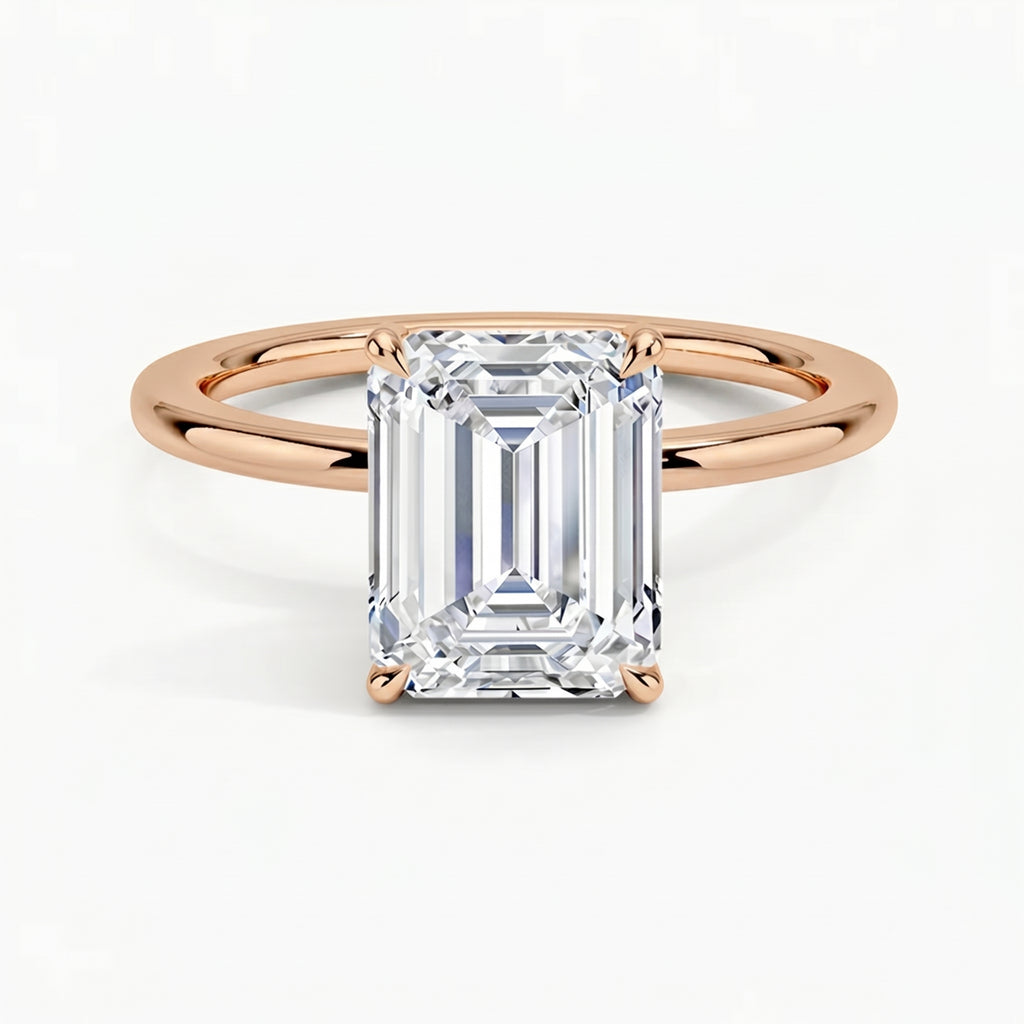 Classic Four-Prong Emerald Solitaire Ring
