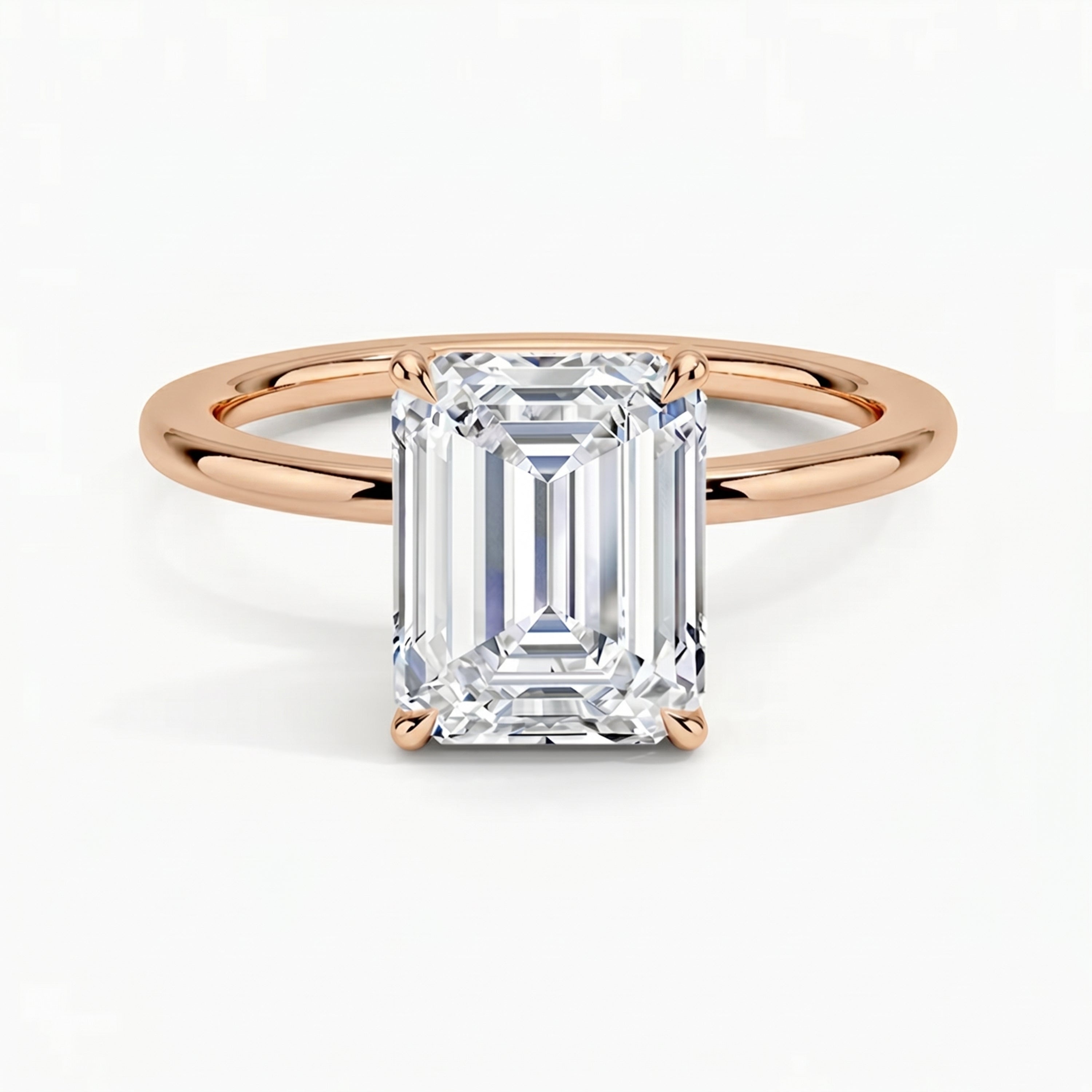 Classic Four-Prong Emerald Solitaire Ring